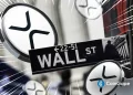 Wall Street Giant Signals XRP Price ‘Long Winter’ After Cutting Target By 65%